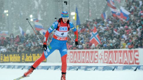 Dmitry Malyshko e Olga Vilukhina assieme a David Beckham in uno spot Adidas